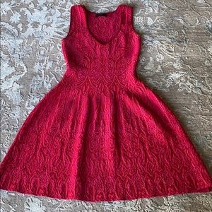 Red/pink fit and flare designer knitted dress.